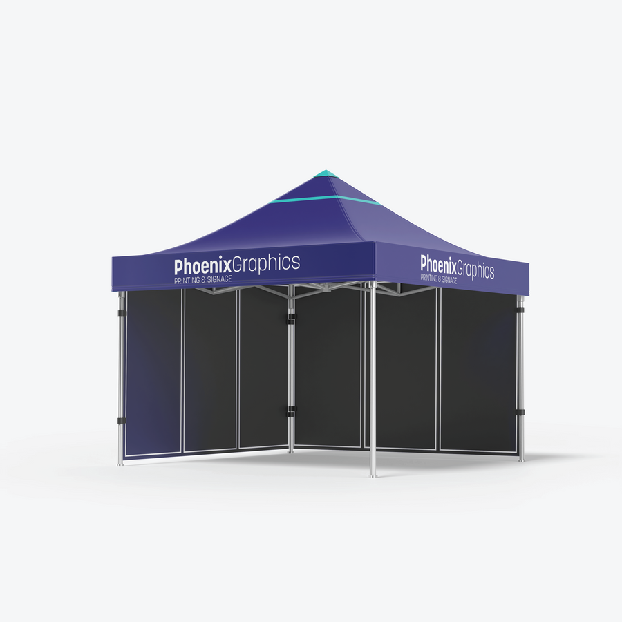 A blue Marquee with Phoenix Graphics Printing & Signage branding on the canopy, silver frame supports, and black fabric side panels is set up against a plain light background.