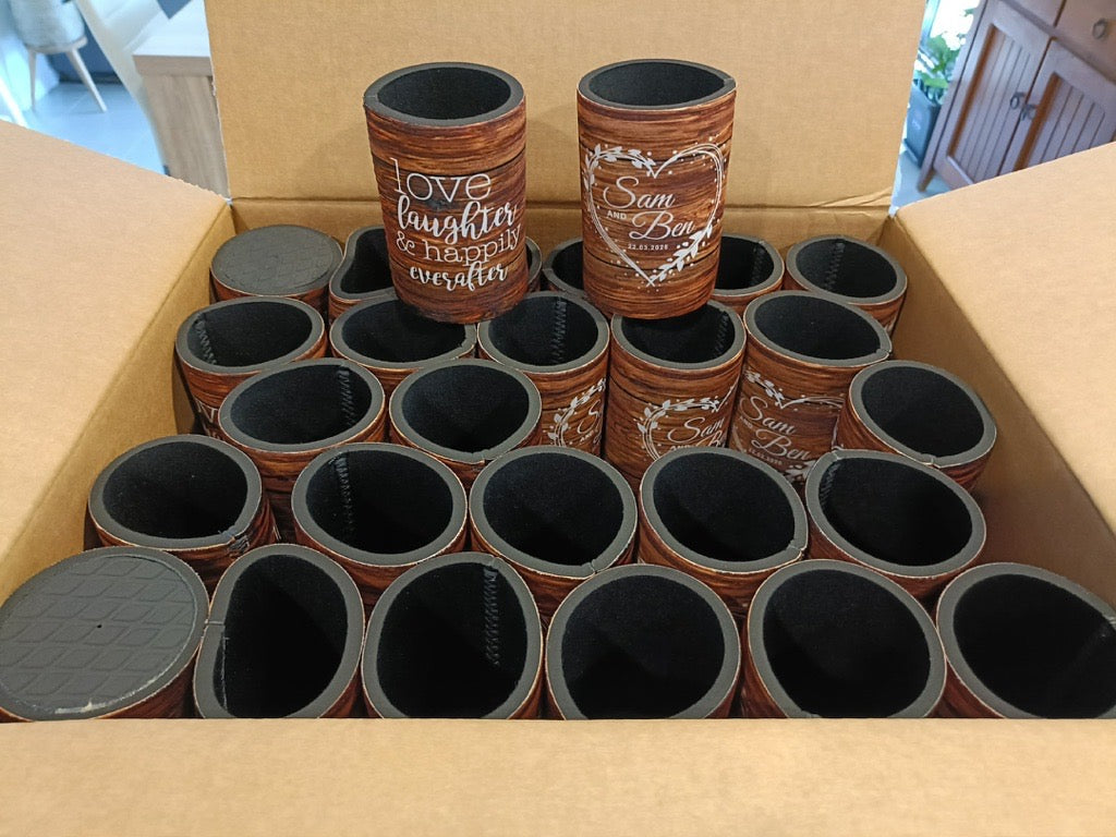 Decorative pots with engraved text in a cardboard box